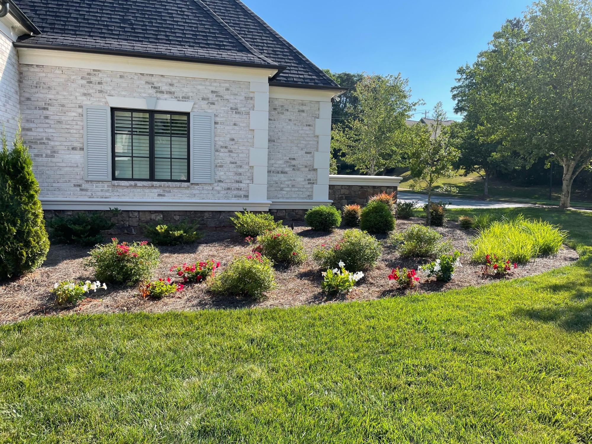 Beautiful flowers arranged in front of the Richard's home