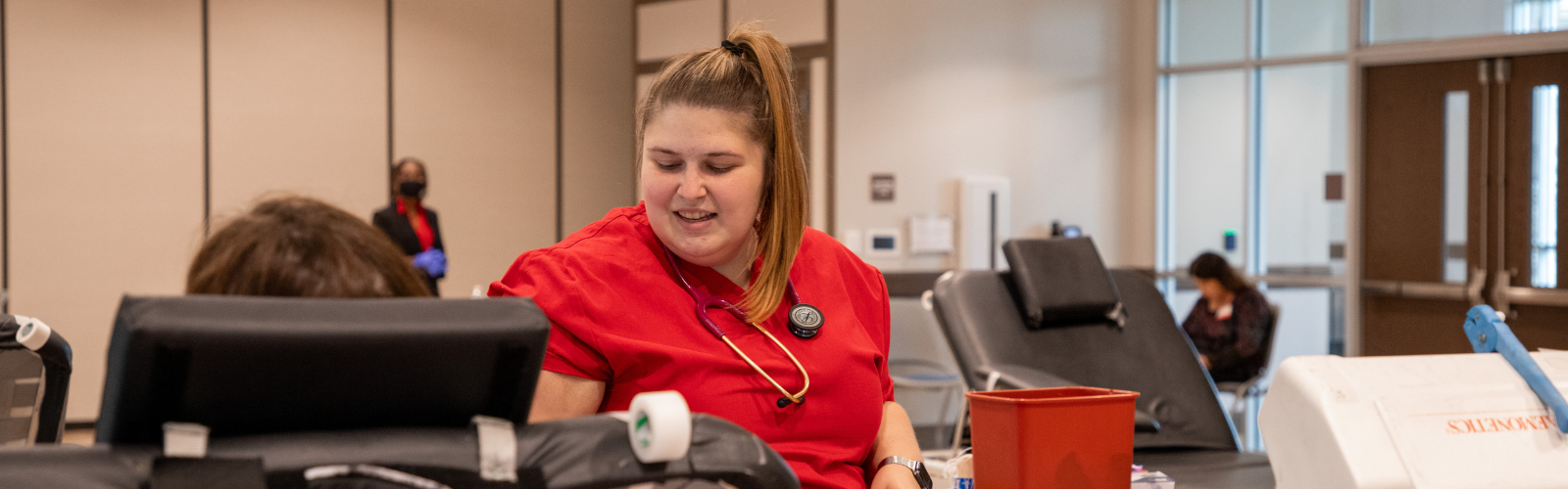 Nurse attends to blood donor